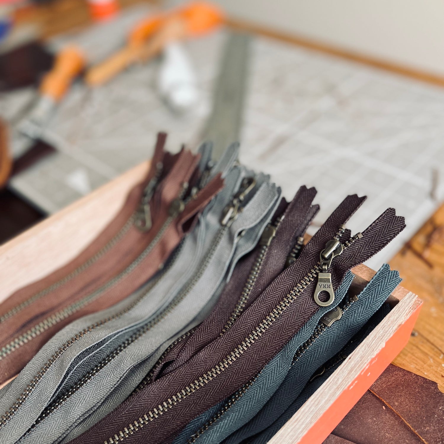 view of high quality YKK zippers that are used in 1974 leather goods